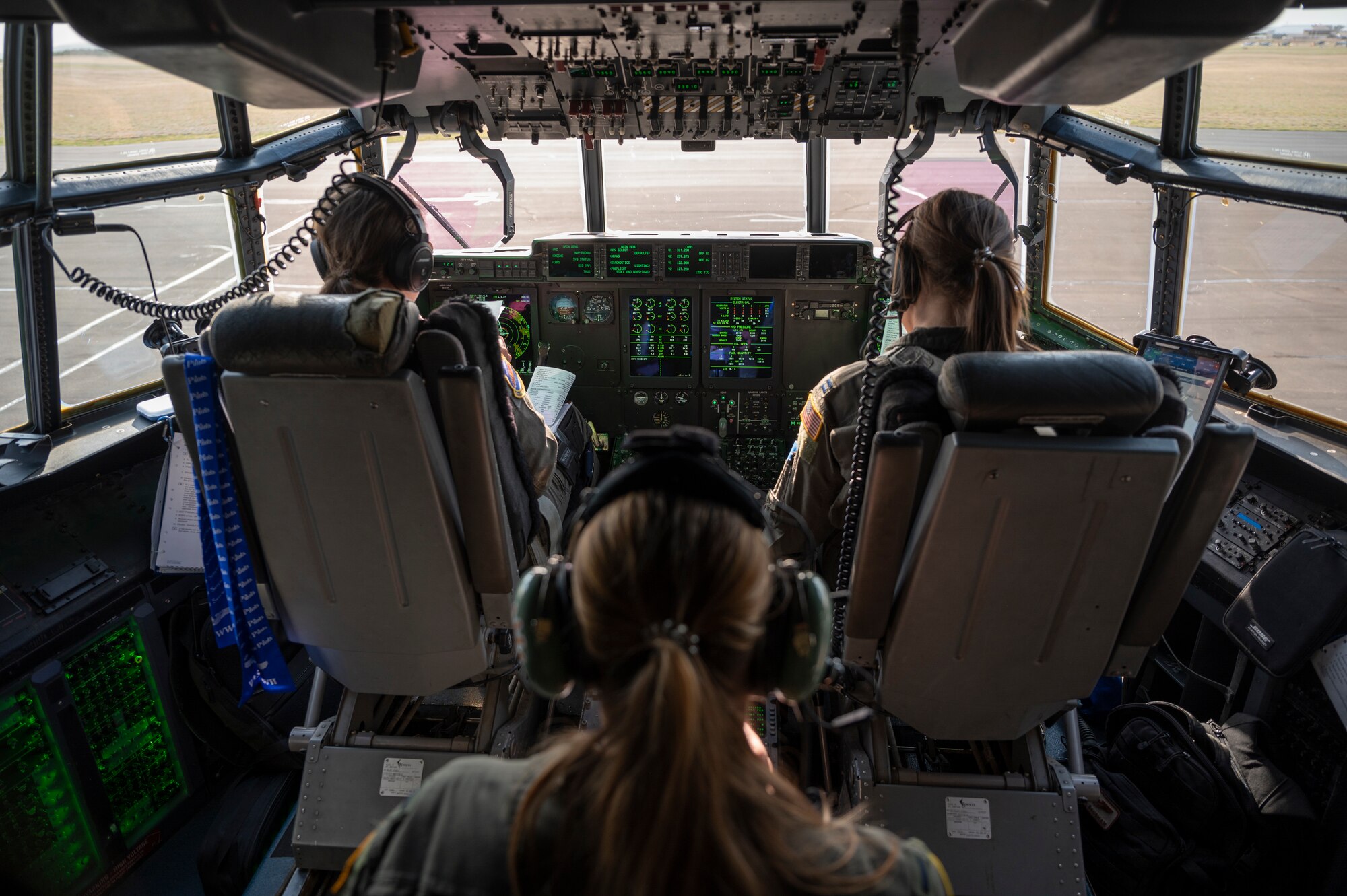 A C-130J Super Hercules aircrew from the 40th Airlift Squadron prepare to take off from Dyess Air Force Base, Texas, April 2, 2022. Two all-female aircrews assigned to the 317th Airlift Wing flew to Avenger Field in Sweetwater, Texas, as part of the Women Airforce Service Pilot Homecoming 80th Anniversary. (U.S. Air Force photo by Senior Airman Reilly McGuire)