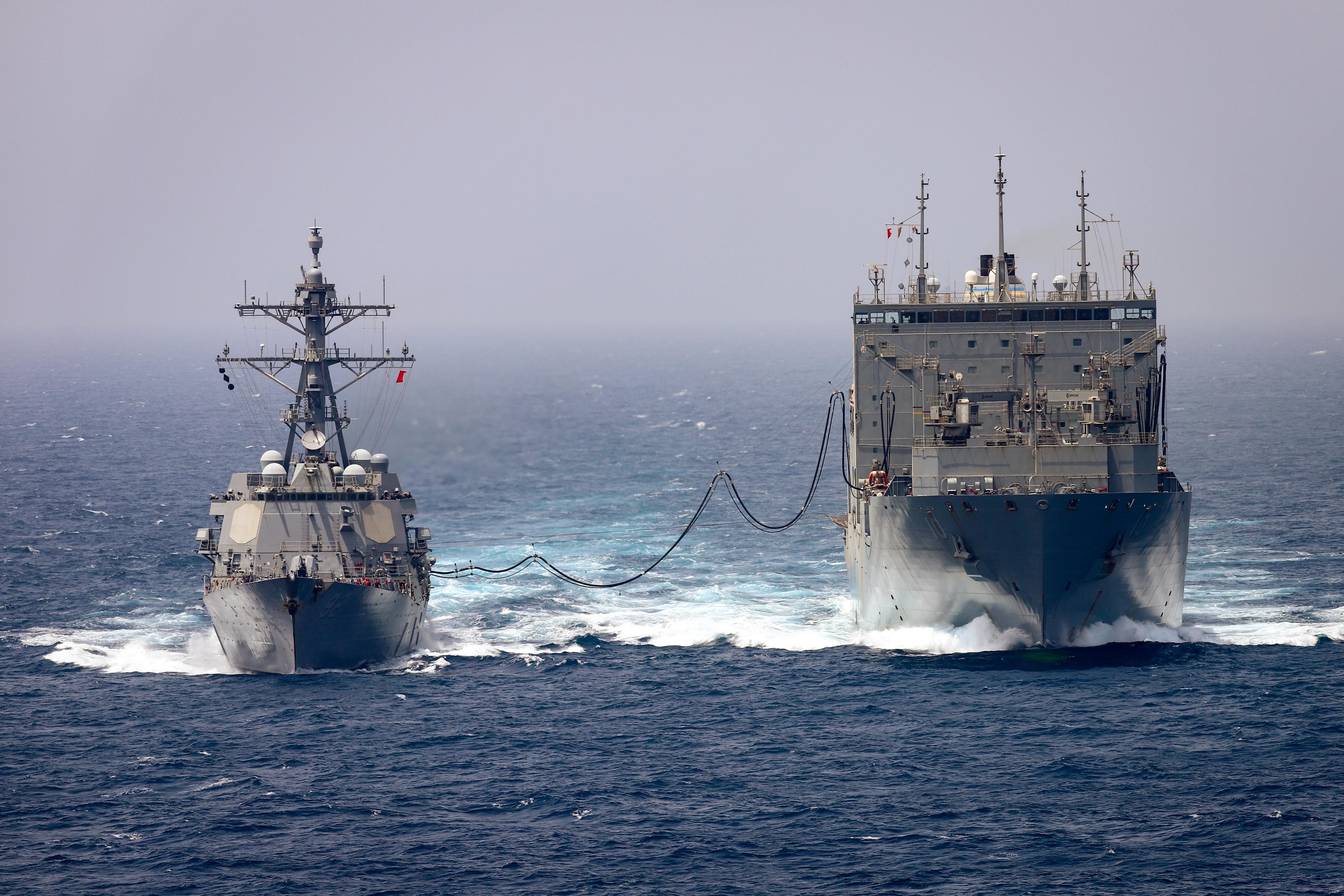 USS Momsen (DDG 92) replenishes from USNS Charles Drew (T-AKE 10) in the Arabian Sea.