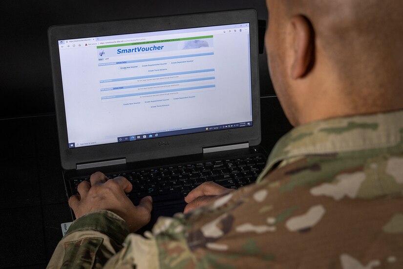 Master Sgt. Alphonzo Hunter, U.S. Army Financial Management Command Operations training noncommissioned officer in charge, uses the Defense Finance and Accounting Service’s SmartVoucher at the Maj. Gen. Emmett J. Bean Federal Center March 9, 2022. USAFMCOM’s Army Military Pay Offices are helping deploy DFAS’ SmartVoucher program to automate the Army’s permanent-change-of-station travel voucher claim process. (U.S. Army photo by Mark R. W. Orders-Woempner)