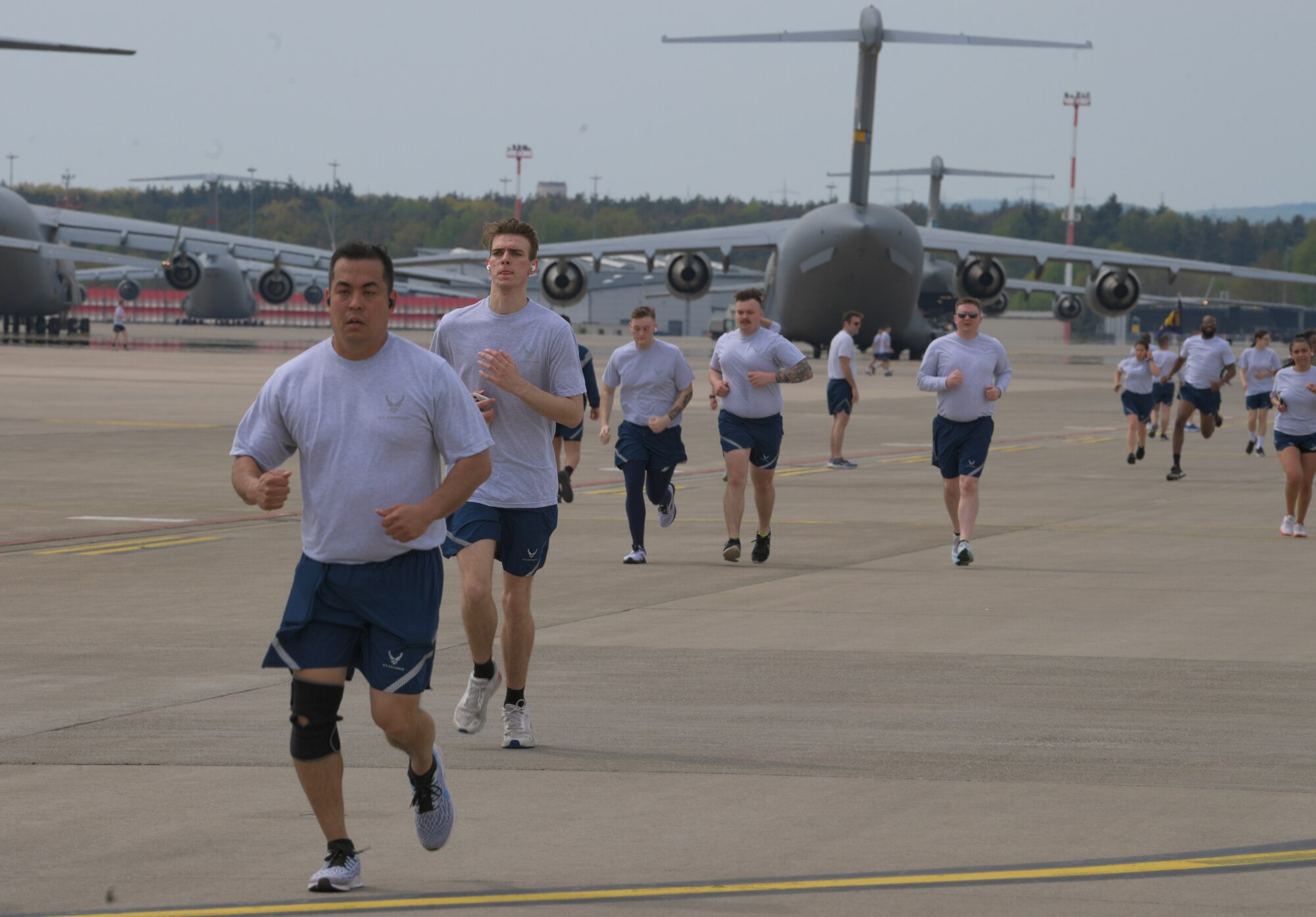 Airmen run on flightline