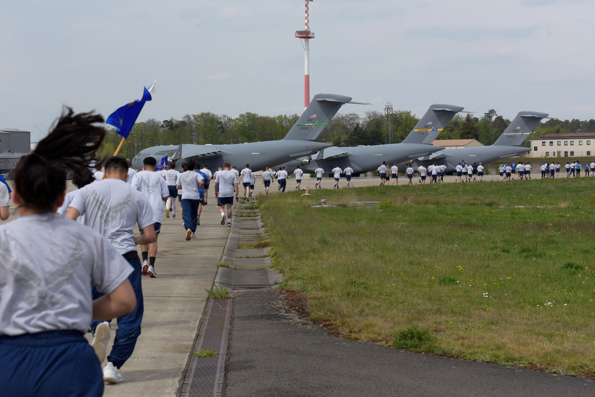 Airmen run on flightline