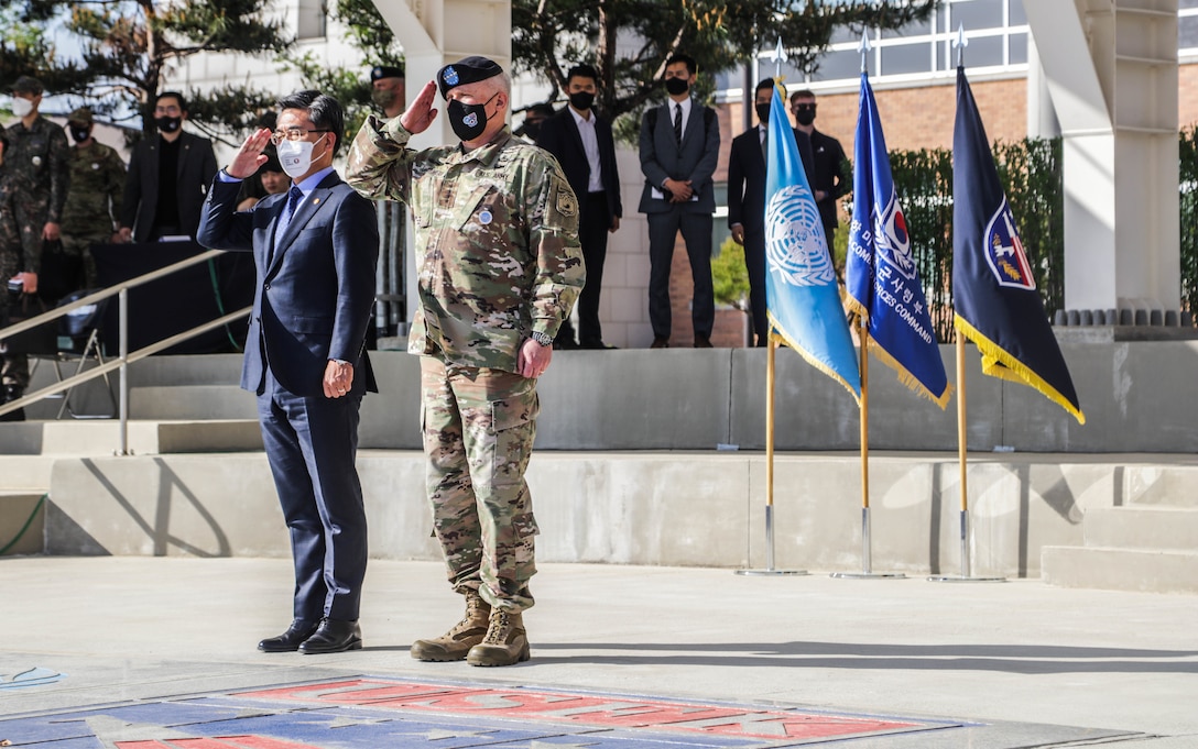 Republic of Korea outgoing Defense Minister Suh Wook and Gen. Paul J. LaCamera, Commander of United Nations Command, Combined Forces Command, and U.S. Forces Korea, salute a formation during an honor guard ceremony in honor of Suh at Camp Humphreys, Republic of Korea, May 5, 2022. Gen. LaCamera expressed his gratitude for Minister Suh’s leadership that helped maintain a robust combined defense posture and ensured an ironclad alliance between the ROK and the U.S.