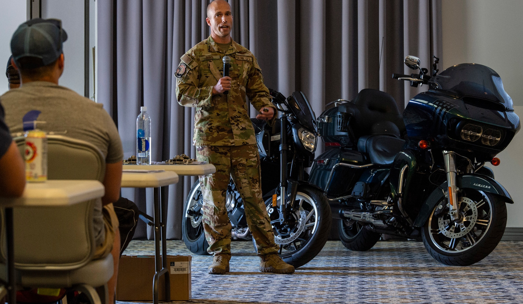 Lt. Col. Joshua Dove, 436th Airlift Wing chief of safety, addresses attendees at the 2022 Motorcycle Safety Day briefing held at The Landings on Dover Air Force Base, Delaware, April 29, 2022. Organized by the 436th AW Safety Office, “The Message of Mentorship” was this year’s theme as riders listened to numerous guest speakers, received refresher training, observed motorcycle demonstrations and participated in a planned ride throughout central Delaware. (U.S. Air Force photo by Roland Balik)