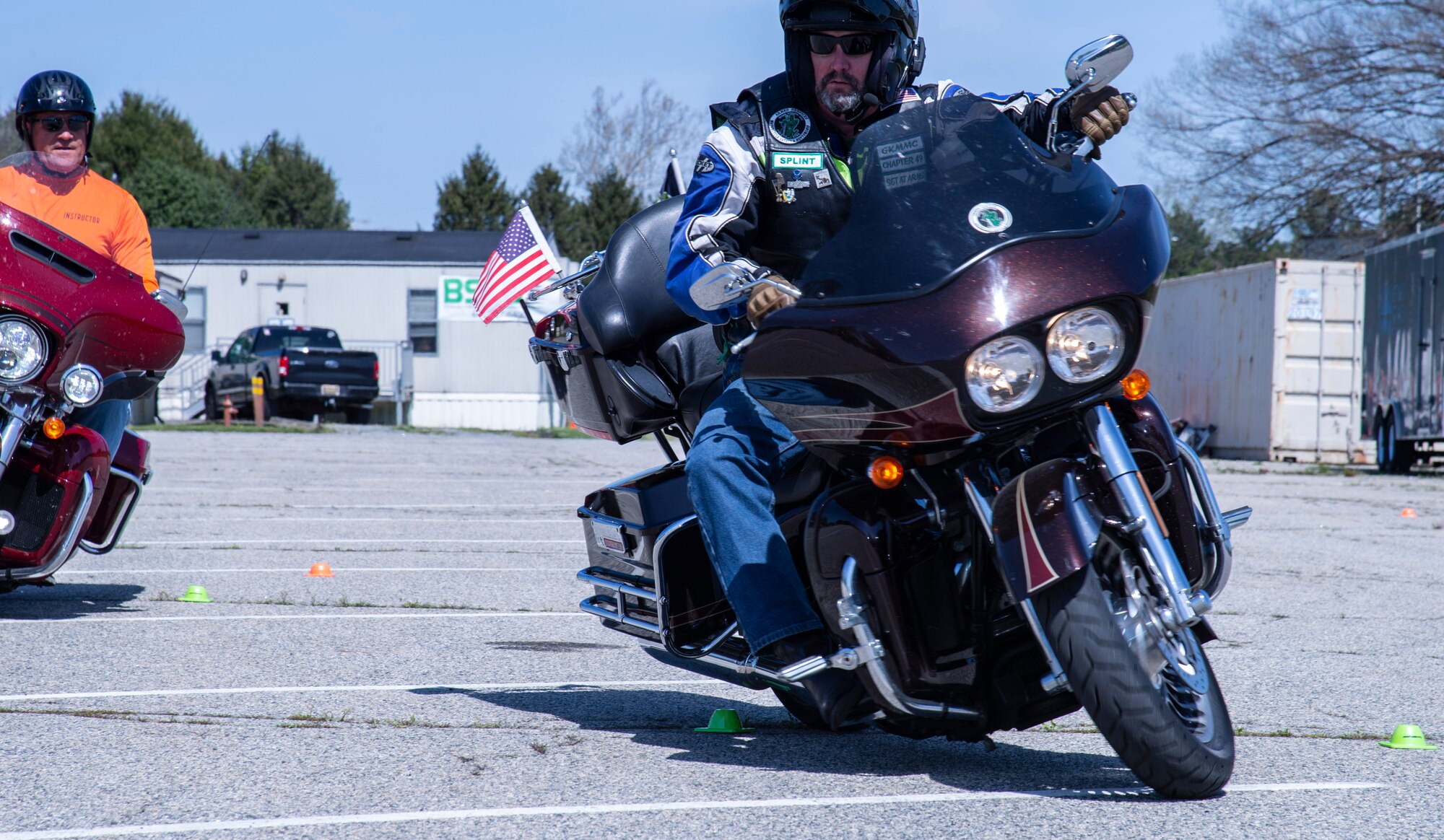 Ken Shinn, Green Knights Military Motorcycle Club, Chapter 49, sergeant at-arms, rides his motorcycle through an obstacle course during the 2022 Motorcycle Safety Day event at The Landings on Dover Air Force Base, Delaware, April 29, 2022. Organized by the 436th Airlift Wing Safety Office, “The Message of Mentorship” was this year’s theme as riders listened to numerous guest speakers, received refresher training, observed motorcycle demonstrations and participated in a planned ride throughout central Delaware. (U.S. Air Force photo by Roland Balik)