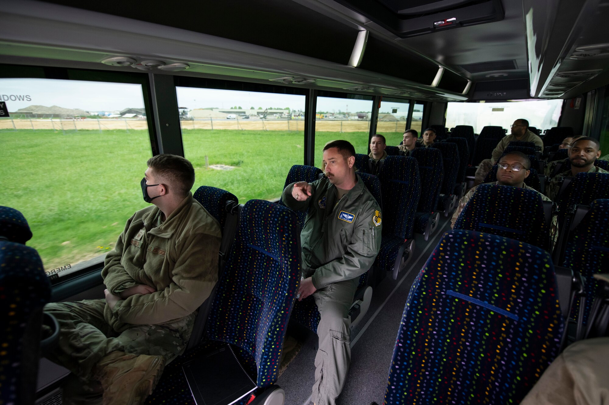 U.S. Air Force Lt. Col. Kevin Groom, center, 420th Air Base Squadron director of operations, provides a base tour for the 501st Combat Support Wing Readiness Working Group to Royal Air Force Fairford, England, April 27, 2022. The group attended an immersion tour at RAF Welford and RAF Fairford to orient themselves with the missions these bases provide. (U.S. Air Force photo by Senior Airman Jennifer Zima)