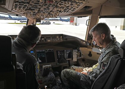 From left, Maj. David Whitney, director of operations for 133rd Air Refueling Squadron, guides a tour of a KC-46A cockpit for Gen. David Hokanson, chief of the National Guard Bureau, at Pease Air National Guard Base in Newington on May 3. Photo by Tech. Sgt. Charles Johnston, NHNG Deputy State PAO.