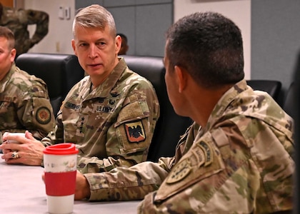 From left, Gen. Daniel Hokanson, chief, National Guard Bureau, meets with NH Adjutant Gen. David Mikolaities and other senior New Hampshire Army and Air National Guard leaders during a visit to Pease Air National Guard Base in Newington on May 3, 2022.