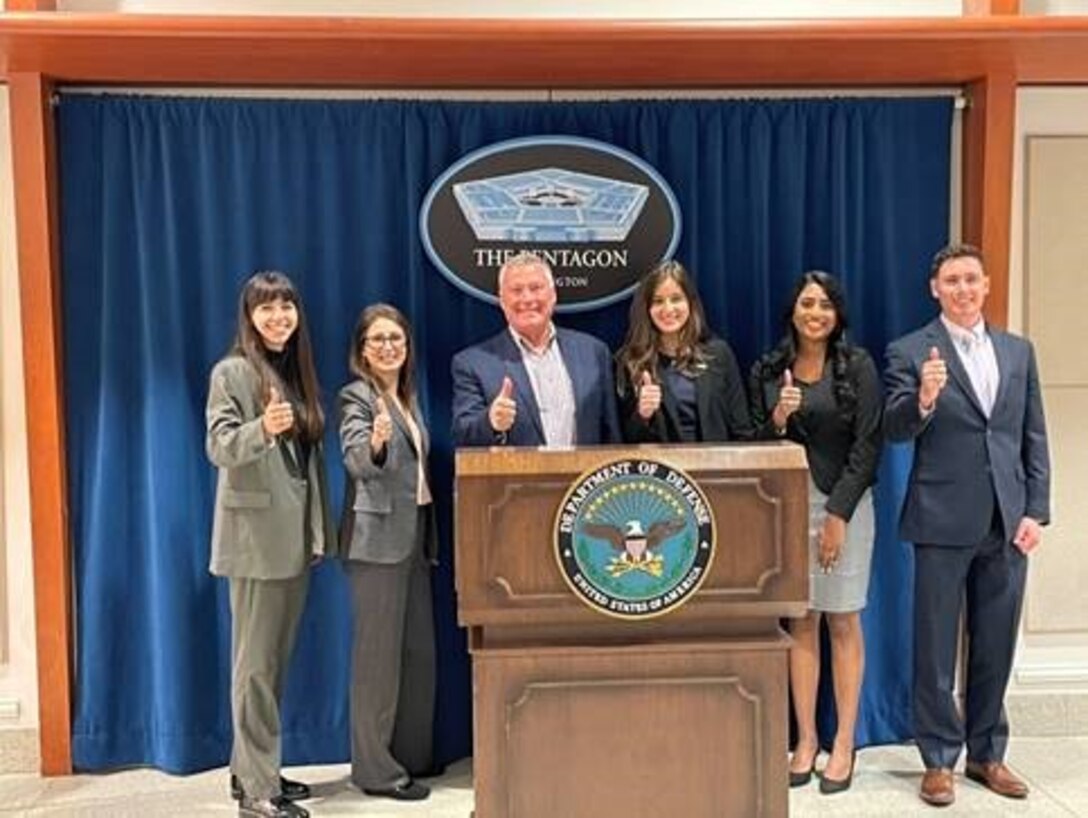 On April 28, five second year graduate students from the Bush School of Government and Public Service at Texas A&M University provided their Spring 2022 Capstone out-brief to senior U.S. Cyber Command staff, as well as senior officials in the Office of the Deputy Assistant Secretary of Defense for Cyber Policy and Joint Staff / J5. From left to right: Lesly Rocha Covarrubias, Sarah Gauthier Gardner, Lt Gen (ret) Kevin McLaughlin, Anna Gibson, Cheryl Thomas, and Ashton Cooksey. (Courtesy Photo)