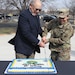 U.S. Army Reserve Spc. Daniela Galvan, assigned to the 13th Psychological Operations Battalion, Arden Hills, Minn., and retired Maj. Gen. Paul Rehkamp, former commander of the 88th Army Reserve Command, cut the ceremonial cake with a saber during the 88th Readiness Division's celebration of the 114th Army Reserve Birthday and Open House at Fort Snelling, Minn., April 29, 2022. (U.S. Army Reserve photo by Sgt. 1st Class Clinton Wood).