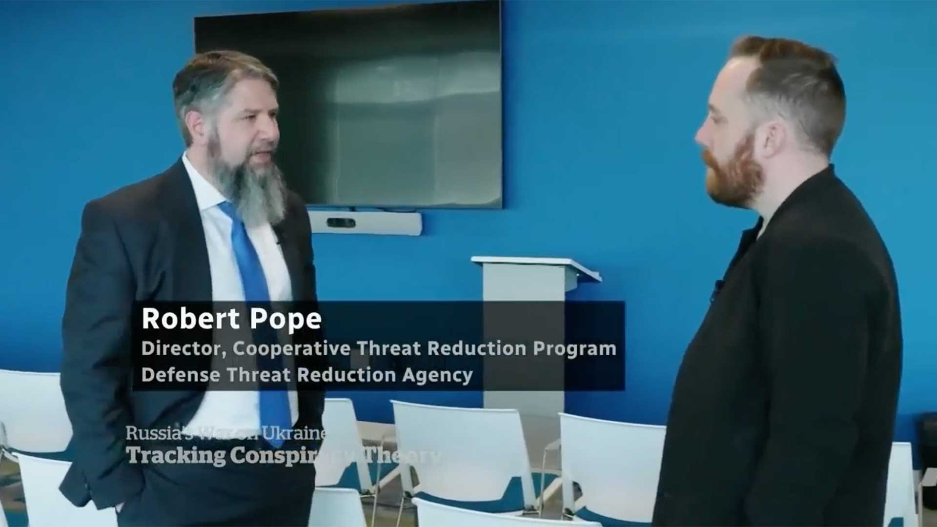 Dr. Robert Pope is interviewed by CBC News in an investigative report that exposes how a QAnon conspiracy theory about U.S.-funded 'Biolabs' in Ukraine morphed into mainstream disinformation.