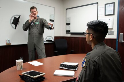 Student pilot receives a pre-flight brief
