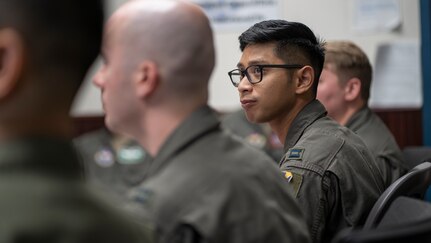 Pilots in a pre-flight brief