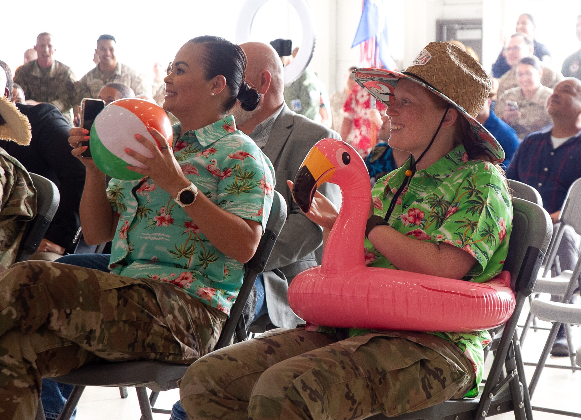attendees wear beach garb at ceremony
