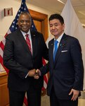 Secretary of Defense Lloyd J. Austin III stands with Japanese Defense Minister Nobuo Kishi prior to a bilateral meeting at the Pentagon, Washington, D.C.,  May 4, 2022.