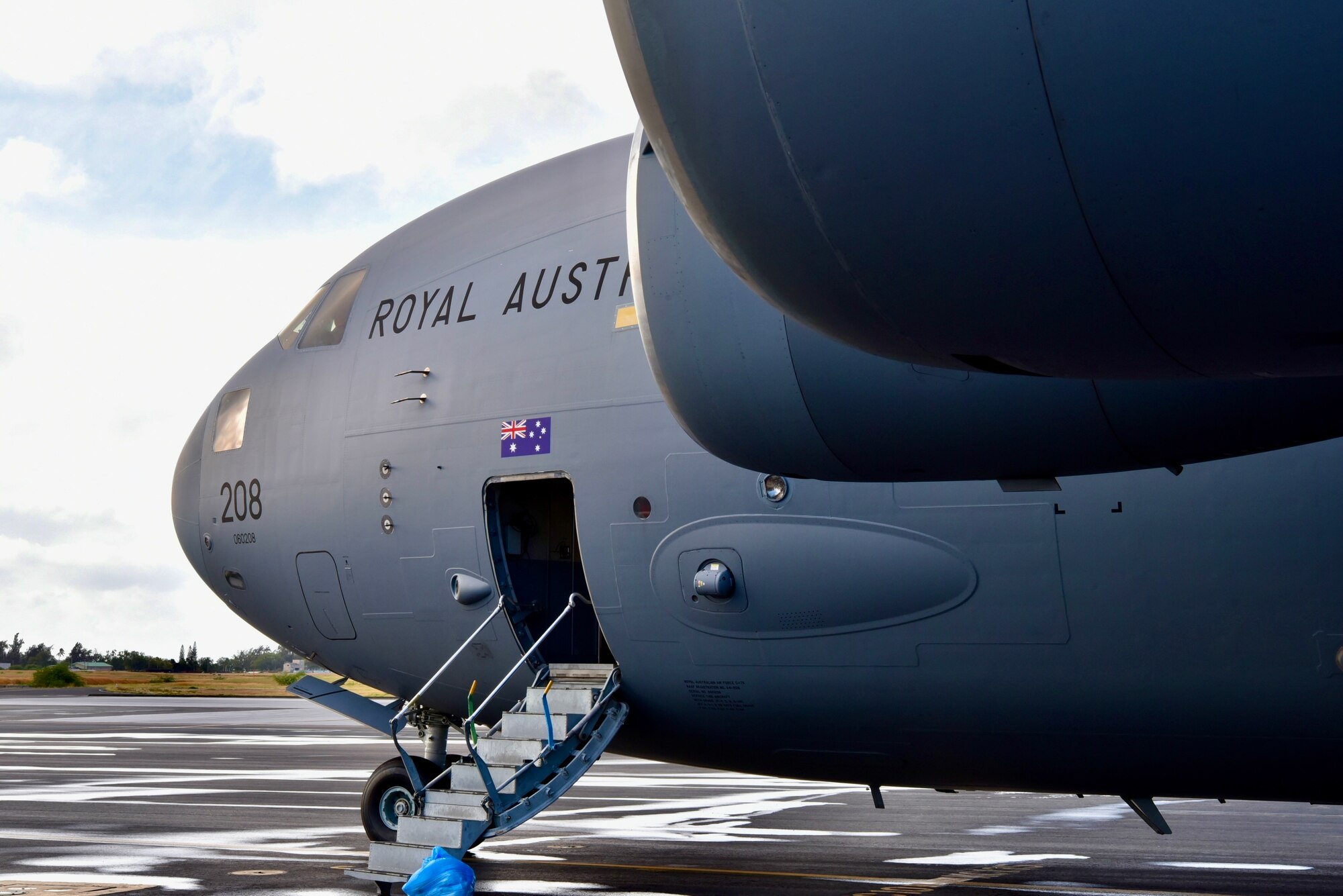 A Royal Australian Air Force C-17 Globemaster III sits on the flight line before the first training mission of Exercise Global Dexterity 2022 at Joint Base Pearl Harbor-Hickam, Hawaii, May 3, 2022. Exercise Global Dexterity 2022 brought a RAF C-17 and crew to the 15th Wing to fly alongside both active duty U.S. aircraft and Hawaii Air National Guard aircraft. (U.S. Air Force photo by 1st Lt. Benjamin Aronson)