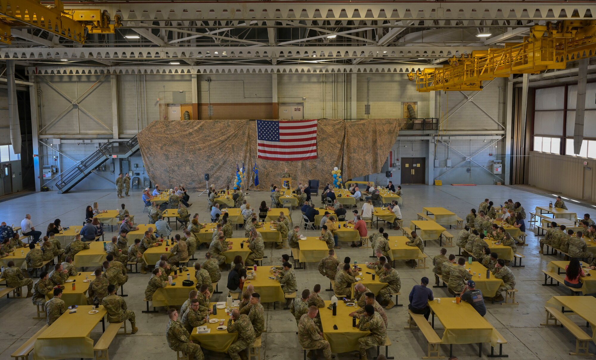 Airmen and civilians from the Basic Expeditionary Airfield Resources base celebrate its 50-year anniversary, May 5, 2022, on Holloman Air Force Base, New Mexico. BEAR base is responsible for providing flexible and responsive resources and expertise to support the Nation's priorities. (U.S. Air Force photo by Airman 1st Class Antonio Salfran)