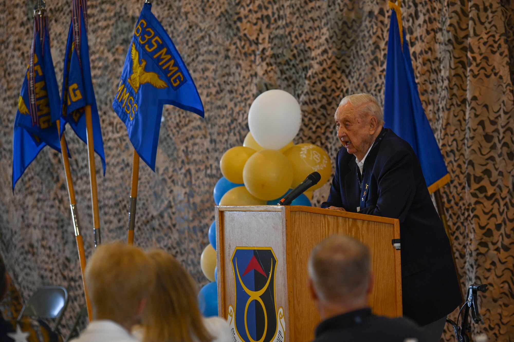 Retired Col. Charles Hartman speaks at the Basic Expeditionary Airfield Resource base 50-year anniversary celebration, May 5, 2022, on Holloman Air Force Base, New Mexico. Hartman, who was the first BEAR Base commander in 1972, was the keynote speaker for this event. (U.S. Air Force photo by Airman 1st Class Antonio Salfran)