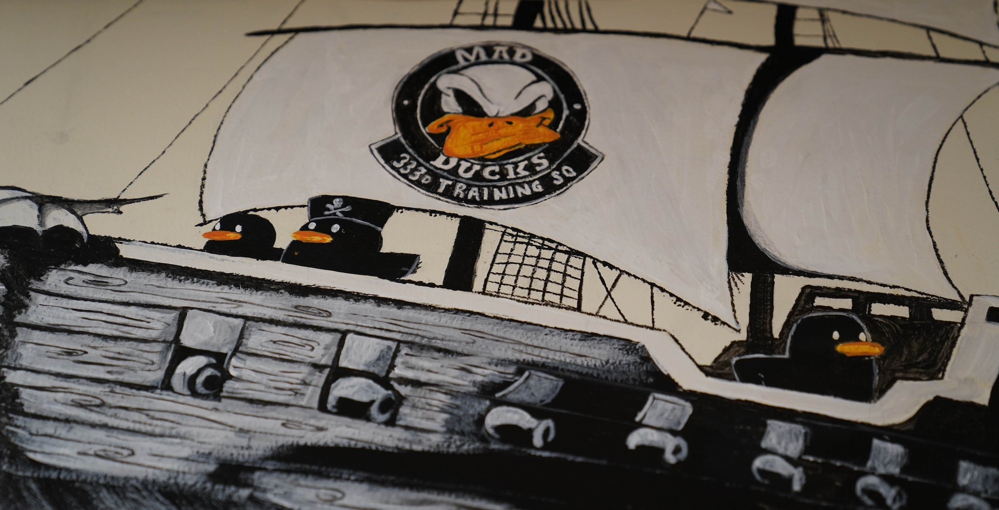 A hand-painted mural decorates the walls of the Lovelace Lab in the 333rd Training Squadron at Keesler Air Force Base, Mississippi, April 18, 2022. The lab was developed by students in the Undergraduate Cyber Warfare Training course to allow for more time with practicing with essential software. (U.S. Air Force photo by Airman 1st Class Elizabeth Davis)