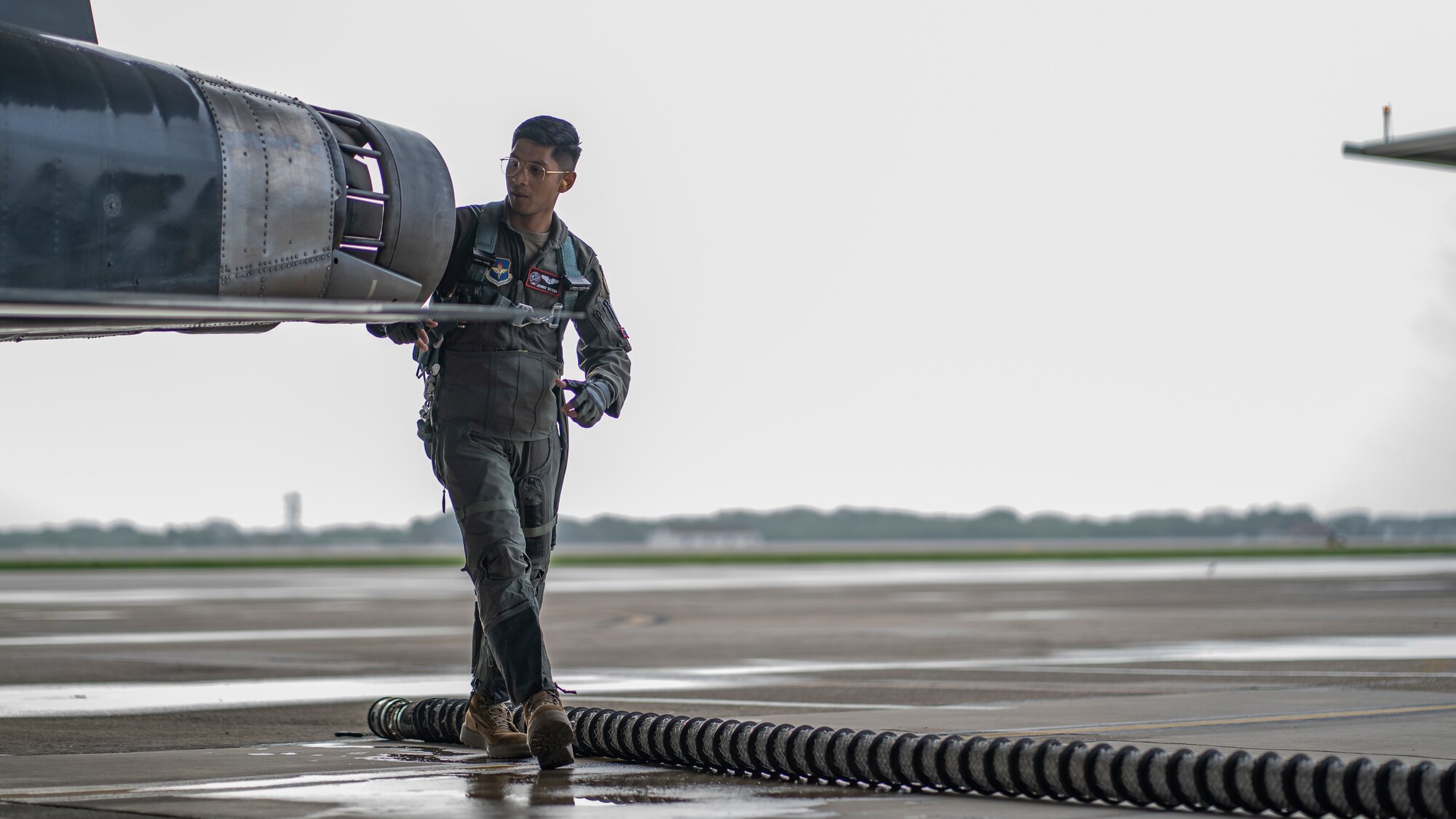 pilot walking around aircraft