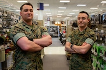 Sgts. Justin Condon and Bradley Briggs Jr., Marine Corps Community Services (MCCS) Marines with Fleet Marine Force, Atlantic, Marine Forces Command, Marine Forces Northern Command, Headquarters and Service Battalion, stand their post at the MCCS Marine Corps Exchange (MCX), Norfolk, Virginia, April 6, 2022. Condon and Briggs Jr. manage the MCX by handling the scheduling, accounting and financing of the MCX in order to keep business consistent. MCCS Marines military occupational specialty exists to support and enhance the operational readiness, war fighting capabilities, and the life quality of Marines and their families. (U.S. Marine Corps photo by Sgt. Kealii De Los Santos)
