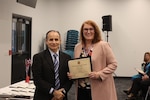 Beth McMaster, Medical supply chain deputy director, accepts the gold medal award for the supply chain’s COVID-19 relief efforts during the Philadelphia Federal Executive Board Excellence in Government awards ceremony at the William J. Green Federal Building, Philadelphia, May 4, 2022. DLA Troop Support received one gold medal, one silver and three bronze during the event that recognized contributions of federal employees.