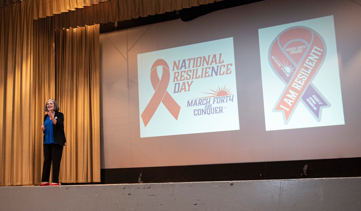 Kristen Christy speaks to an audience at Wright-Patterson AFB.