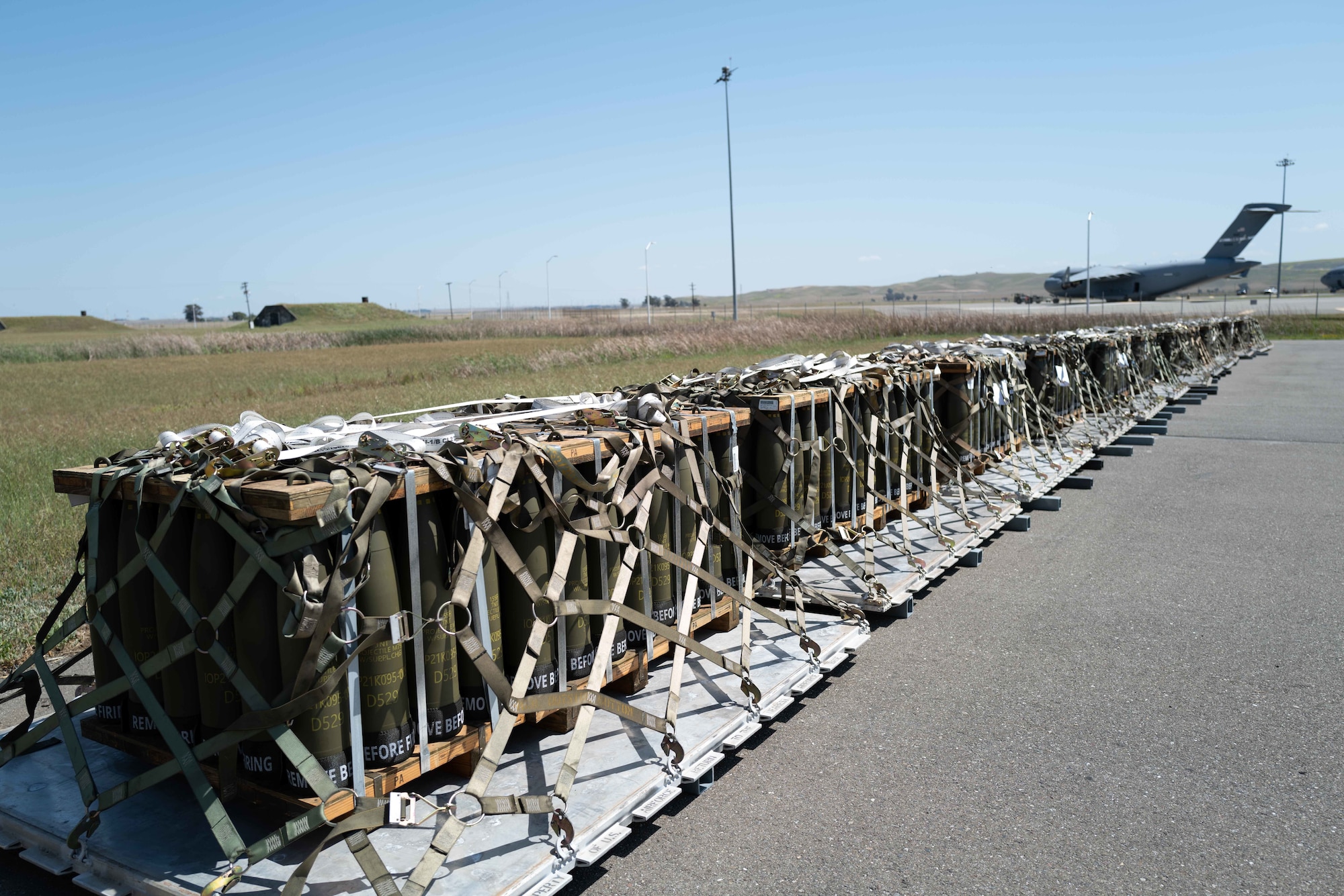 Photos of Airmen moving munitions for EUCOM.