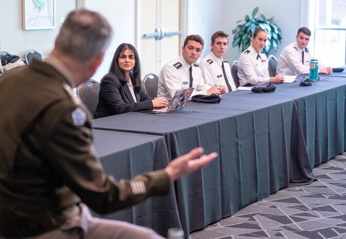 Girls in Tech Nashville meet with General Paul Nakasone and NSA director Rob Joyce during roundtable discussion at the Summit on Modern Conflict and Emerging Threats. Courtesy photo from Vanderbilt University.