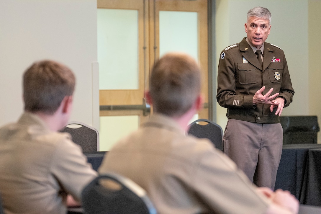 Girls in Tech Nashville meet with General Paul Nakasone and NSA director Rob Joyce during roundtable discussion at the Summit on Modern Conflict and Emerging Threats. Courtesy photo from Vanderbilt University.