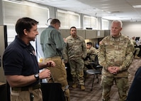 U.S. Army North Commanding General, Lt. Gen. John Evans, left, explains Army North’s roles, responsibilities and capabilities during a catastrophic manmade or natural hazard response to FEMA Region 8 Regional Response Coordination Center personnel during Exercise Vibrant Response 22, April 26, 2022.