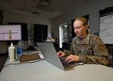 U.S. Air Force Capt. Stephanie Ohms, a bioenvironmental engineer assigned to the Air Force Radiation Assessment Team, generates a dosimetry report, for the Joint Task Force Civil Support Forward Command Element, which logs the amount of notional radiation personnel responding to a simulated nuclear detonation have accrued during Exercise Vibrant Response 22, April 27, 2022.