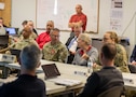 U.S. Army Maj. Gen. Jeff Van, center left, Joint Task Force Civil Support commanding general, and Nancy Dragani, center right, the Federal Emergency Management Agency Region 8 Regional Administrator, discuss the DoD supporting FEMA in responding to a catastrophic manmade or natural incident during Vibrant Response 22, April 29, 2022.