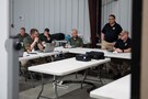 Hans Lageschulte, an exercise program manager with Joint Task Force Civil Support, briefs during a meeting as part of exercise Guardian Response (GR) 22 at Camp Atterbury, Indiana, May 4. GR22 is a U.S. Army Forces Command-directed external evaluation and culminating training event for U.S. Northern Command’s Chemical, Biological, Radiological and Nuclear Response Enterprise consequence management entities. The exercise is focused on the Defense Support of Civil Authorities mission sets.