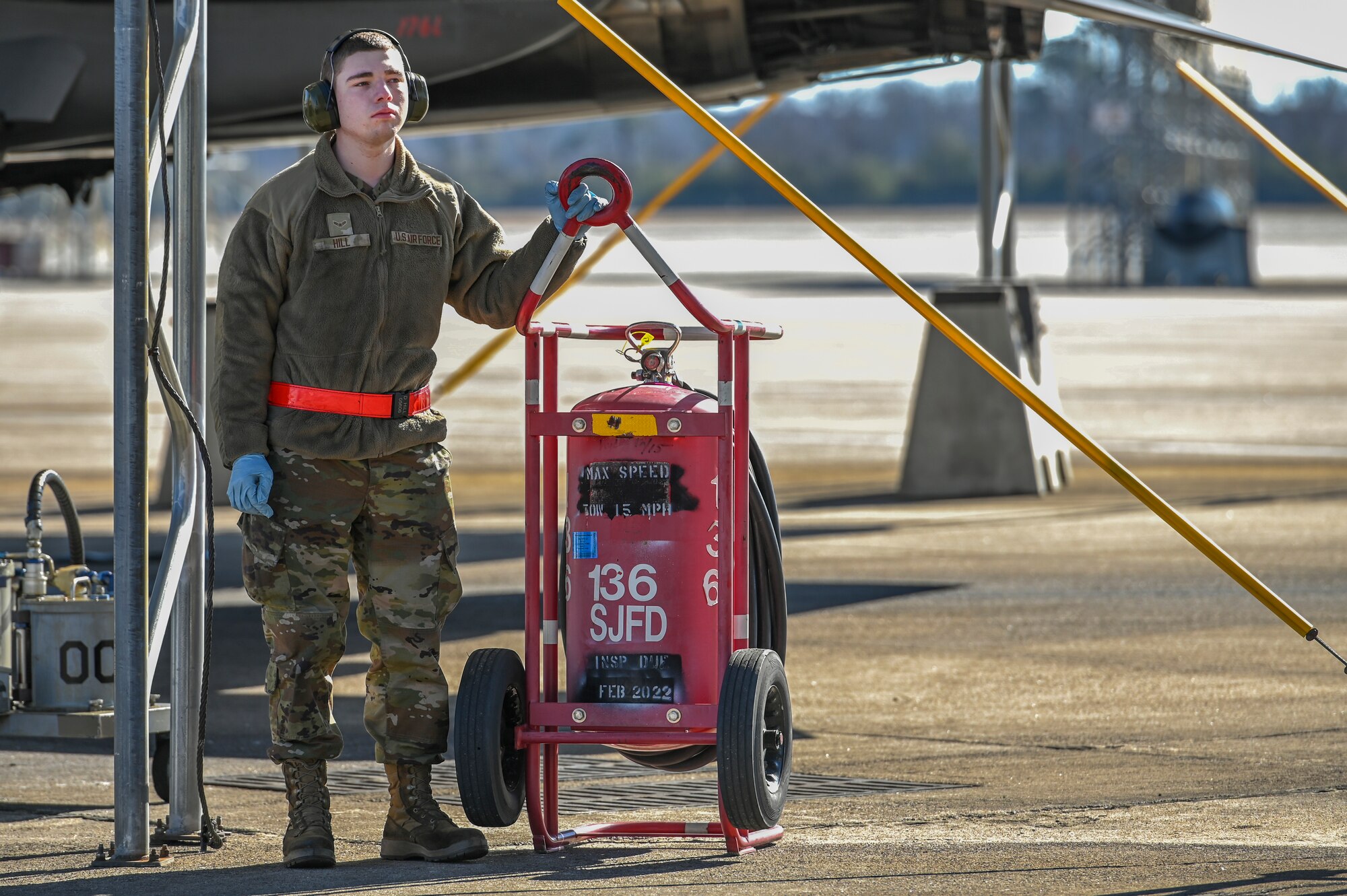 Avionics apprentices maintain the radar navigation and communication systems on aircraft. When assisting the crew chief, Hill stood on standby to provide emergency procedures if needed and served as a second pair of eyes for the crew chief. (U.S. Air Force photo by Senior Airman Kylie Barrow)