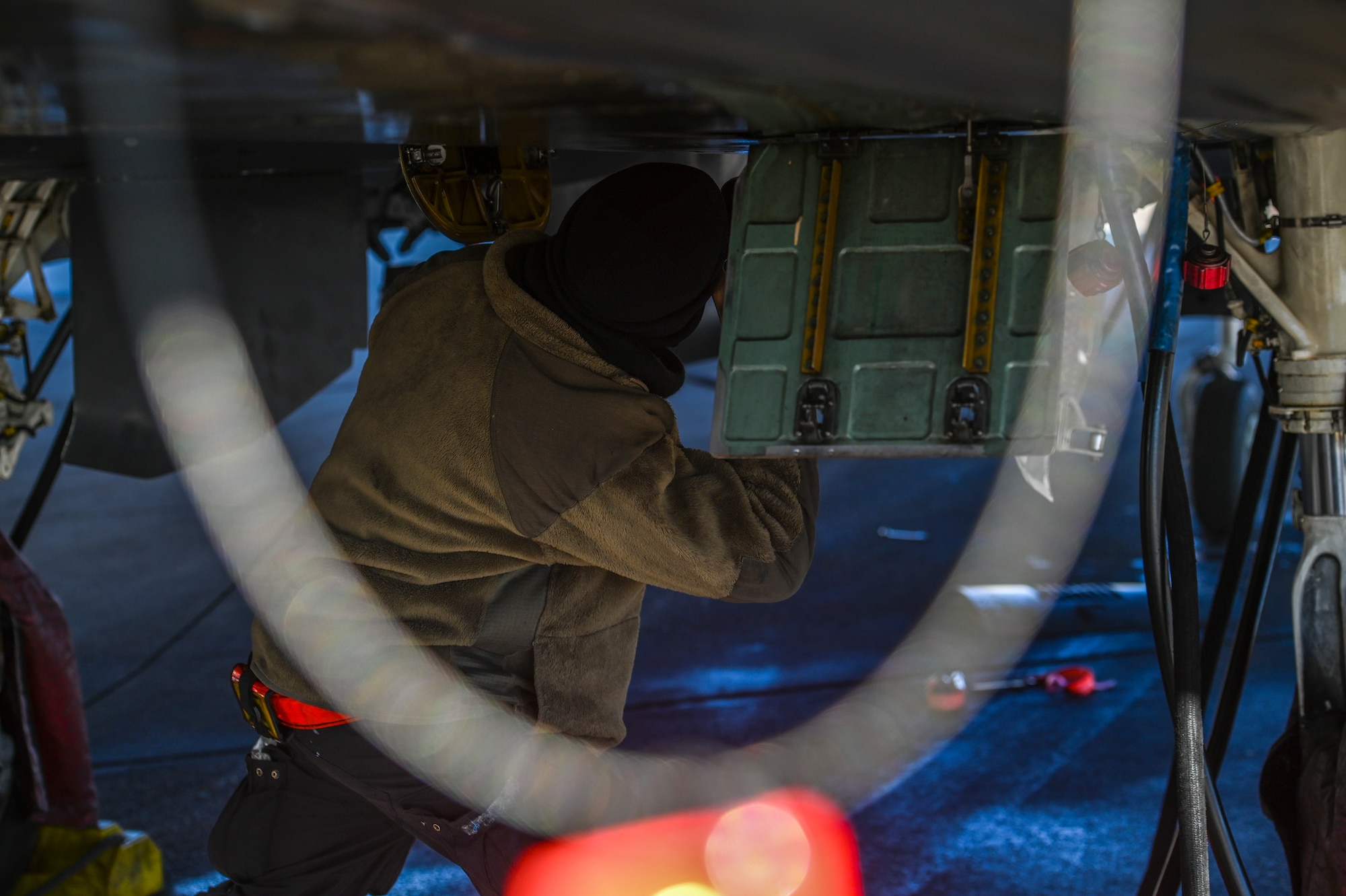 Crew chief duties include extensive pre-flight and post-flight inspections and all-around maintenance to ensure the aircraft is ready for takeoff. (U.S. Air Force photo by Senior Airman Kylie Barrow)