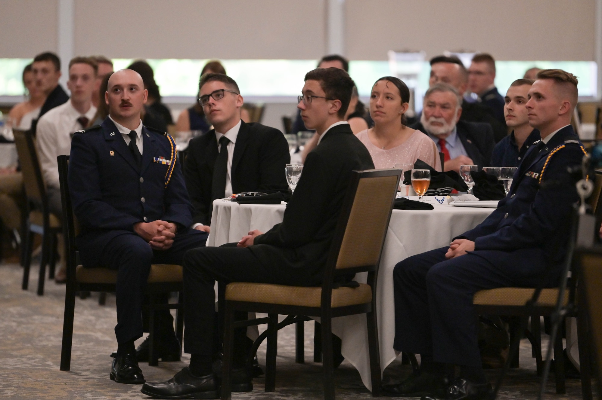 U.S. Air Force ROTC Detachment 172 cadets and guests listen to Col. Ryan Hayde, 23rd Wing vice commander, during his speech at Valdosta, Georgia, April 27, 2022. Hayde has served honorably for 21 years and shared his knowledge of how to inspire the young Airmen that these new officers will be leading. (U.S. Air Force photo by Senior Airman Rebeckah Medeiros)