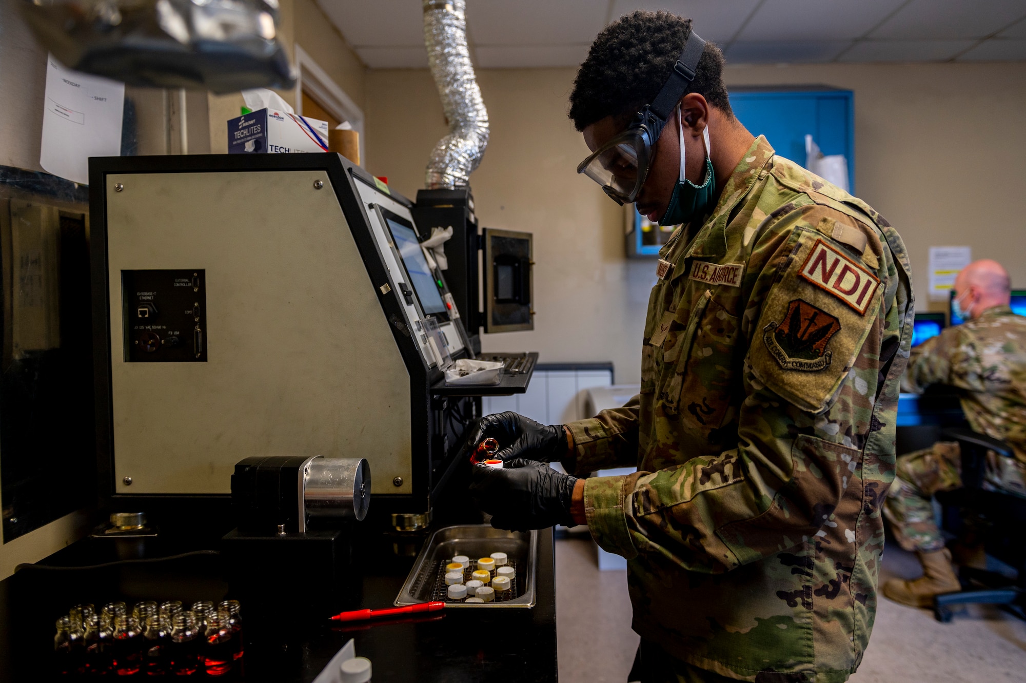 Madison examined the oil to determine if it contained elements from worn down metal within the engines. (U.S. Air Force photo by Senior Airman Kylie Barrow)