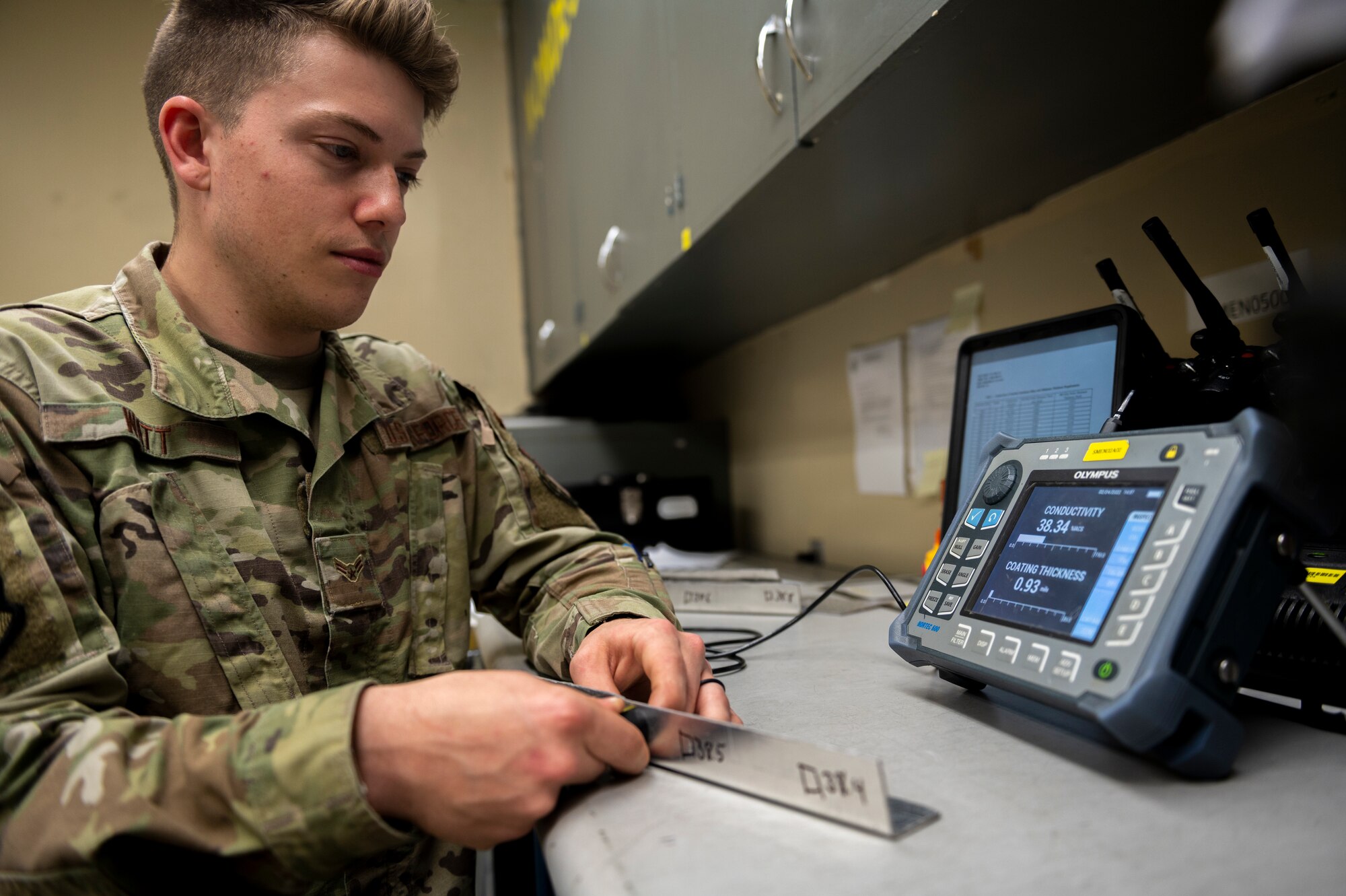 Watt tested the sheet metal to ensure it was viable for application and use to repair an F-15E Strike Eagle. (U.S. Air Force photo by Senior Airman Kylie Barrow)
