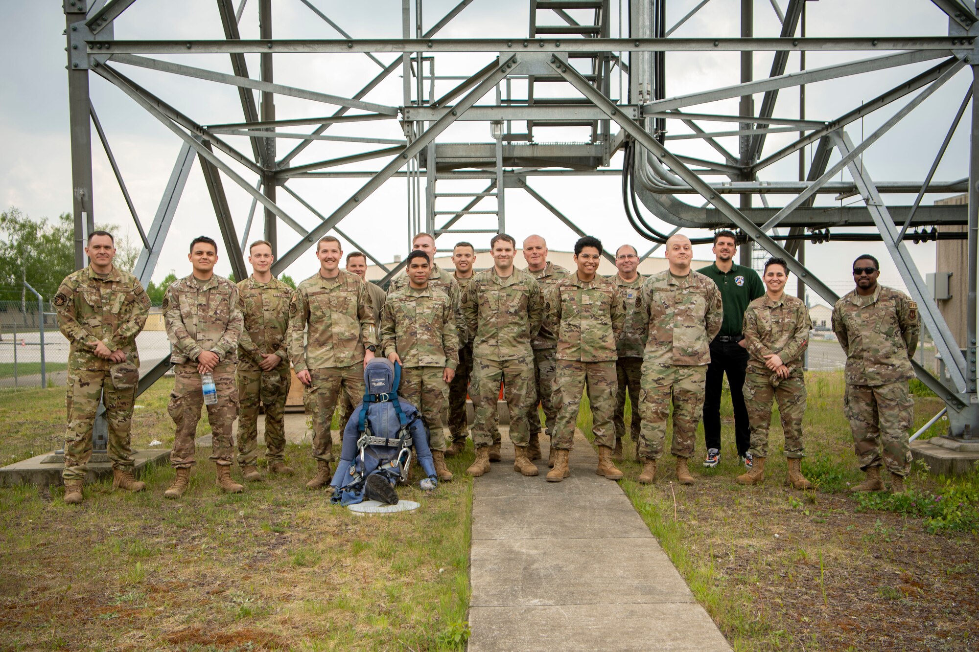 Members from 52nd Fighter Wing Safety, 52nd Operations Support Squadron and 52nd Civil Engineer Squadron pose for a photo, May 4, 2022, on Spangdahlem Air Base, Germany. The 52nd FW Safety office observed the nationally recognized National Safety Stand-Down week to prevent falls in construction. (U.S. Air Force photo by Airman 1st Class Jessica Sanchez-Chen)