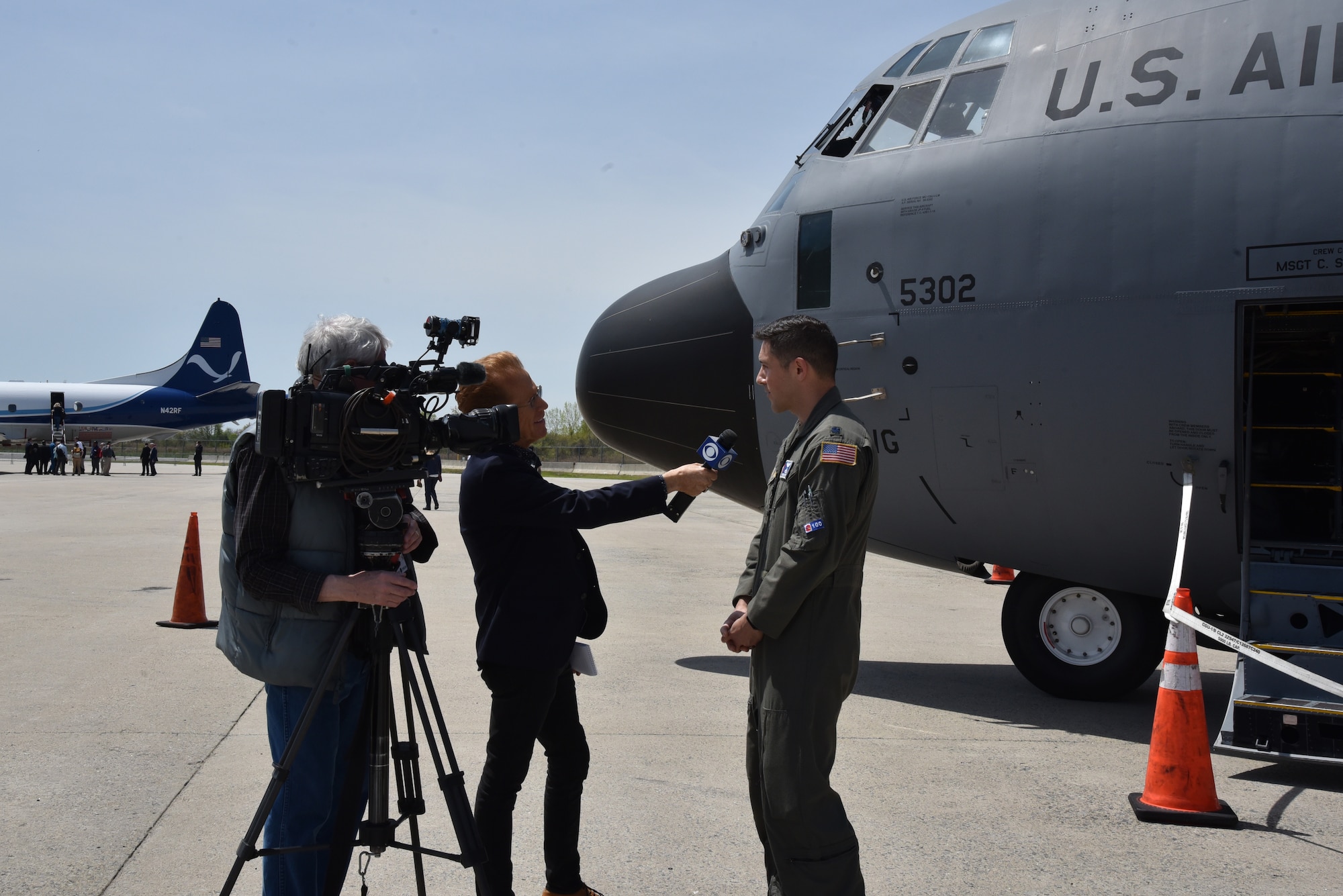 Media video and interview an Air Force Reserve aerial reconnaissance weather officer in front of WC-130J Super Hercules.