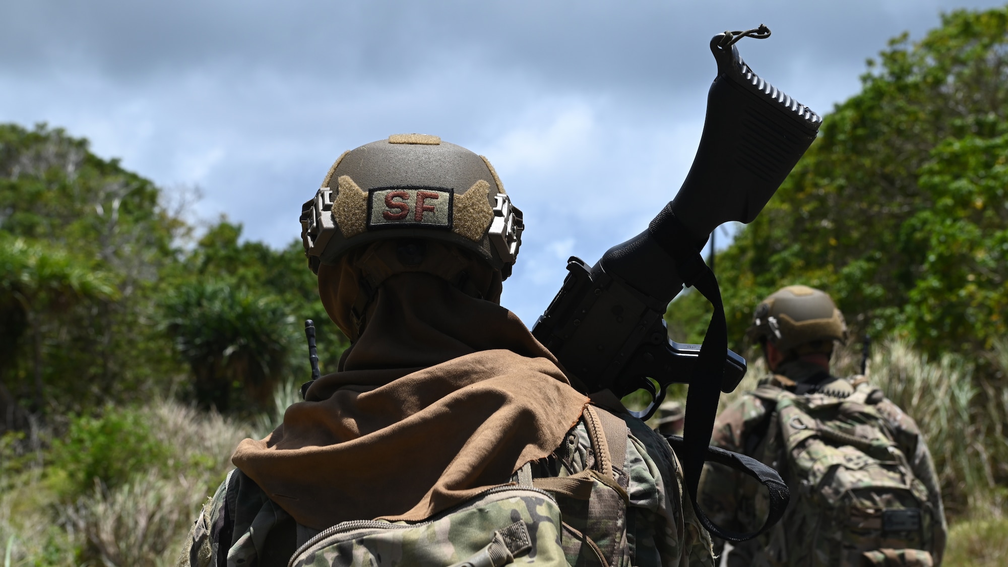 A U.S. Air Force Airman with the 736th Security Forces Squadron walks foot patrol during a combat training course at Andersen Air Force Base, Guam, May 3, 2022.