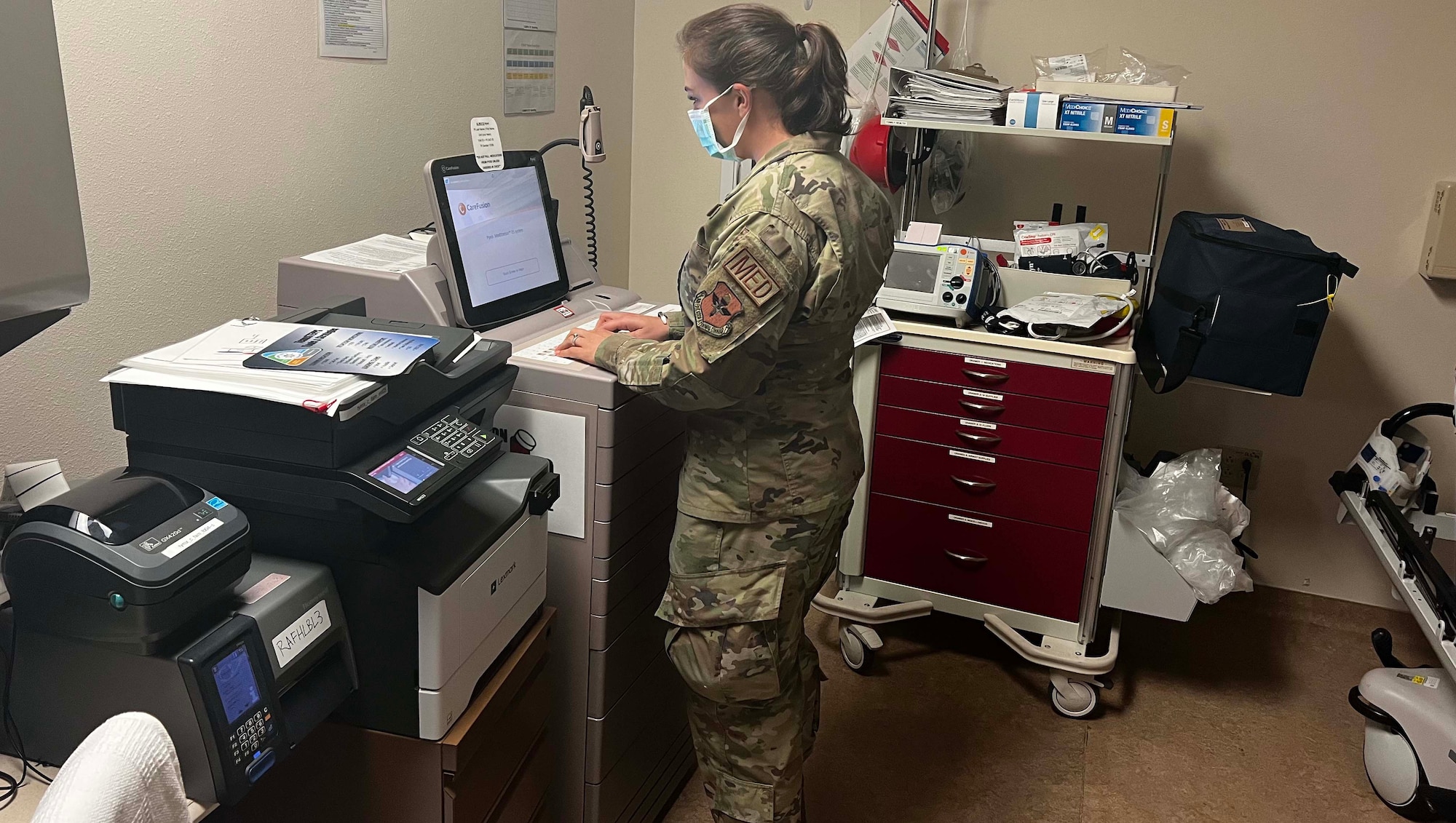Image of an Airmen working at a computer.