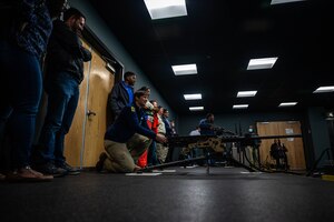 Members of the Learn, Explore, Absorb and Disseminate (LEAD) Peninsula Program shoot at a simulation range at Joint Base Langley-Eustis, Virginia, May 4, 2022. Since its beginning, LEAD Peninsula has graduated over 1,000 diverse and accomplished individuals. (U.S. Air Force photo by Senior Airman Anthony Nin Leclerec)