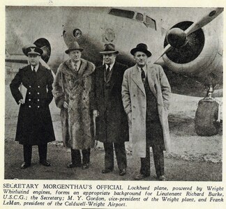 A newsprint photo of Henry Morgenthau & his pilot, LT Richard Burke in front of his CG transport aircraft.