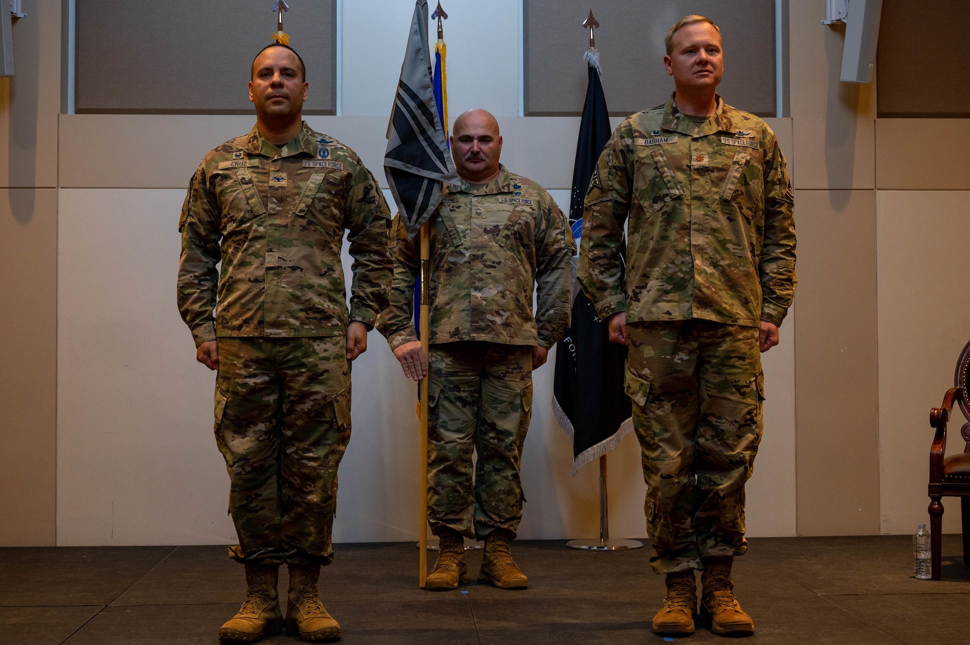 U.S. Space Force Col. Miguel Cruz, Space Delta 4 commander, joined by U.S. Space Force Maj. Luke Basham, Space Delta 4 Detachment 1 commander, prepare to deactivate the DEL 4, DET 1 at Buckley Space Force Base, Colo., March 24, 2022.