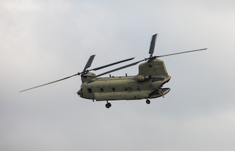 Paratroopers from the U.S., Belize, Mexico, Guyana, and Colombia conducted a freefall jump from a CH-47 Chinook helicopter in to the Manatee training site to begin two weeks of jungle training May 8, 2022 during TRADEWINDS22.