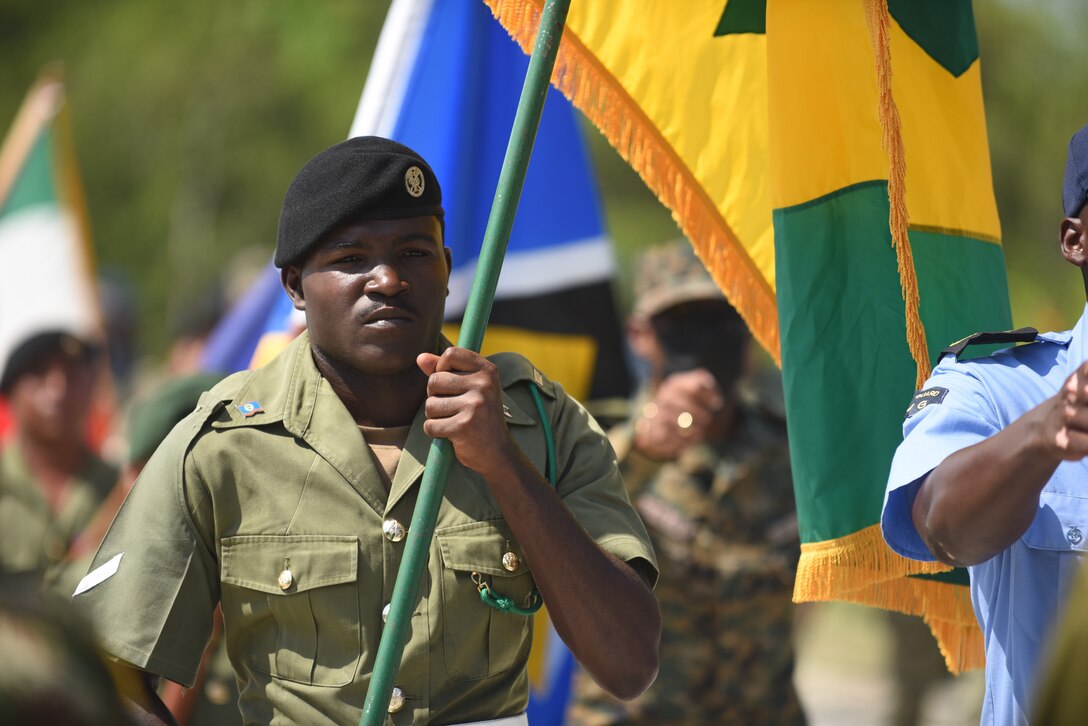 A member of the Belize Defence Force departs the field after participating in the opening ceremony of Tradewinds 2022 in Belize City, Belize, on May 7, 2022.