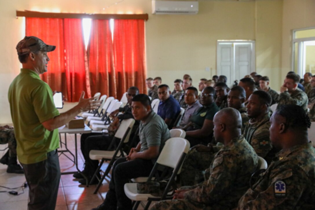 Jose Rodriguez, Acting Chief, U.S. Southern Command Human Rights Office, briefs partner nation participants on Basic Human Rights at Belmopan Police Training Academy for Exercise Tradewinds 2022, May 8, 2022.