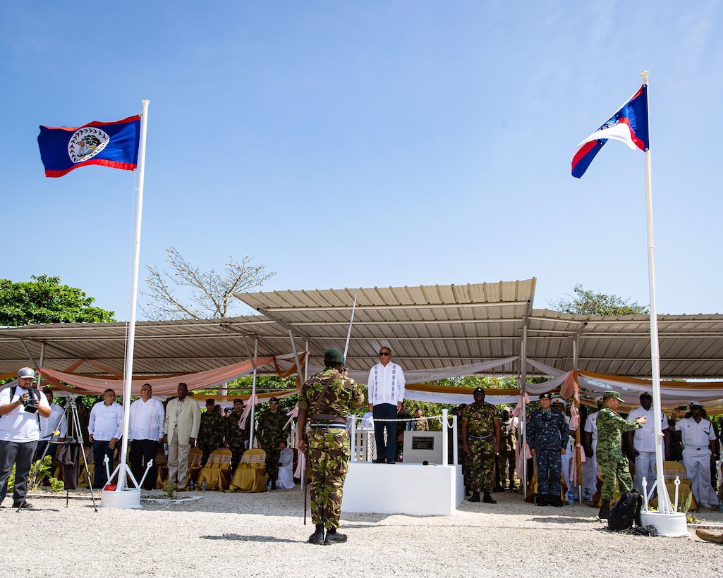 The Belize Defence Force Parade Commander salutes the Belizean Prime Minister, Honourable John A. Briceño, during the opening ceremony of Exercise TRADEWINDS 2022 in Belize City, Belize on May 7, 2022.