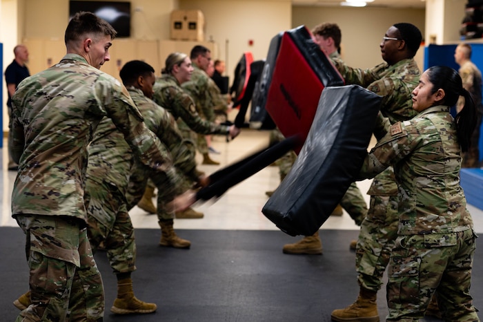 Airmen partake in baton training